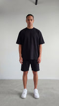CAMISETA OVERSIZE NEGRO 250 GRAMOS.